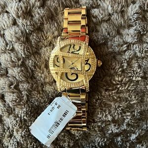 BRAND NEW Gold watch with 4 small diamond chips. JBW Diamond Timepieces